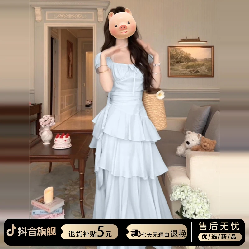 法式温柔风蓝色连衣裙子女夏季2025新款设计感不规则蛋糕度假长裙