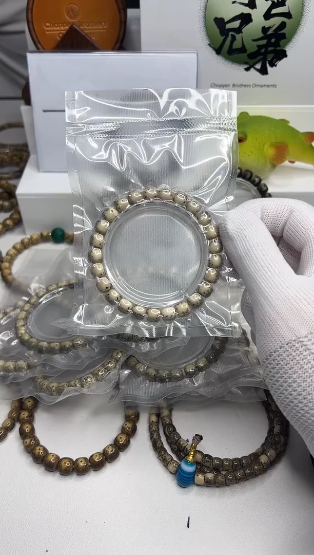 手串星月菩提339  石玉料河豚9*8mm