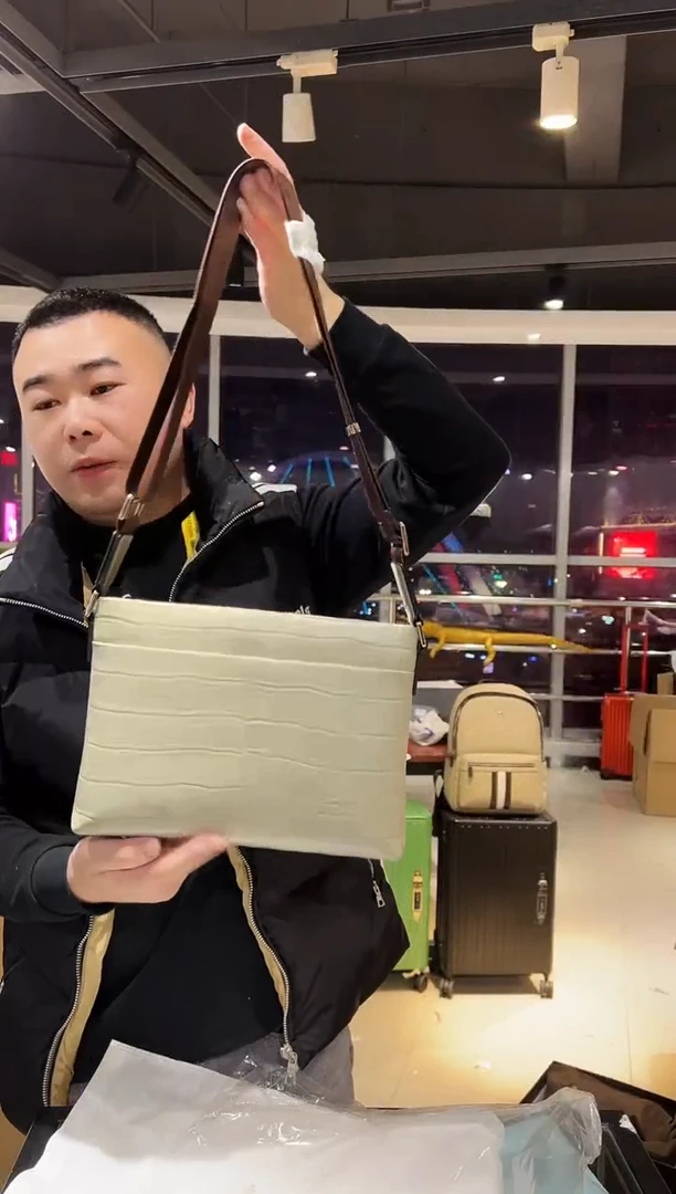 头层牛皮韩爵绅士包包皮具618