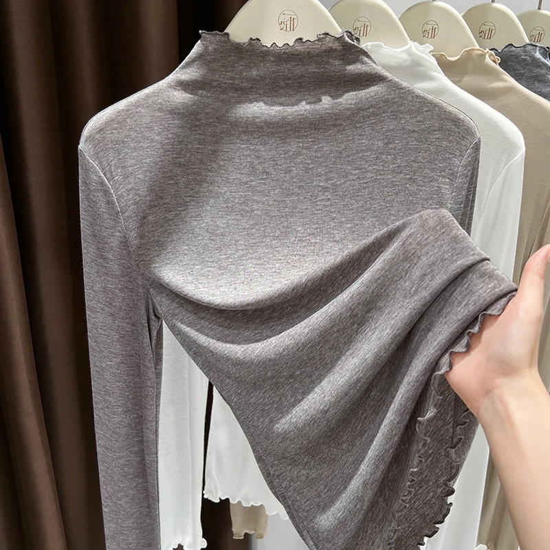 设计感摩卡色木耳边半高领针织长袖上衣女2025春季爆款修身打底衫