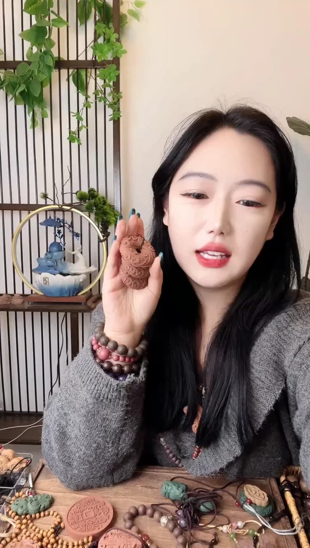 珠串息肌祥云扣