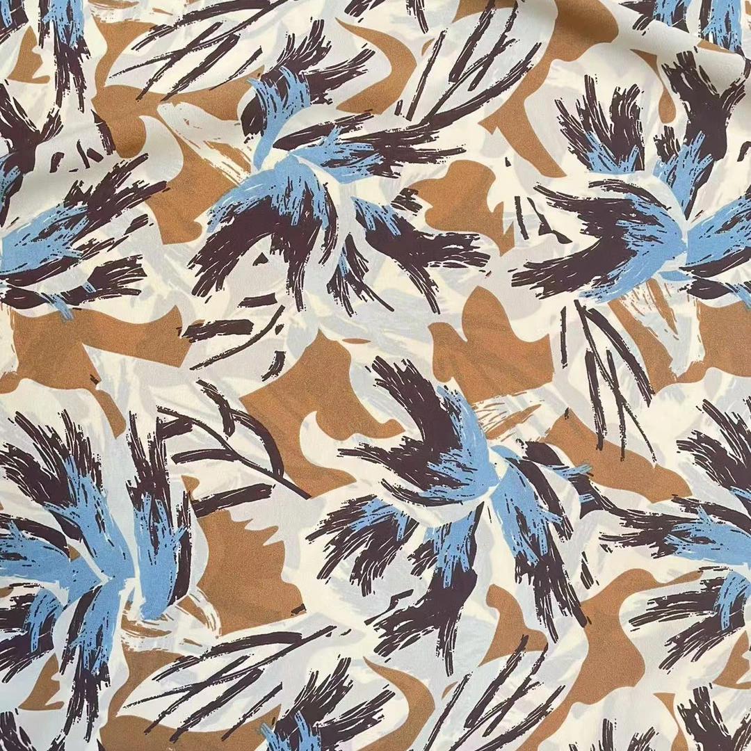 咖底蓝白黑花弹力双绉时尚面料（不支持7天无理由）