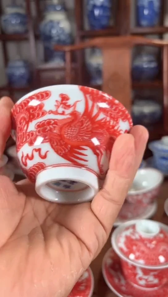 在**方柴窑釉里红龙凤呈祥杯杯