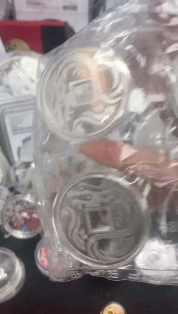 纯银阿*老建行80克银章li