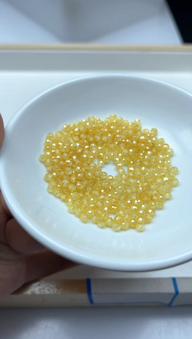 散珠天然锆石未镶嵌A1553 黄锆石切面3mm50个9.9元