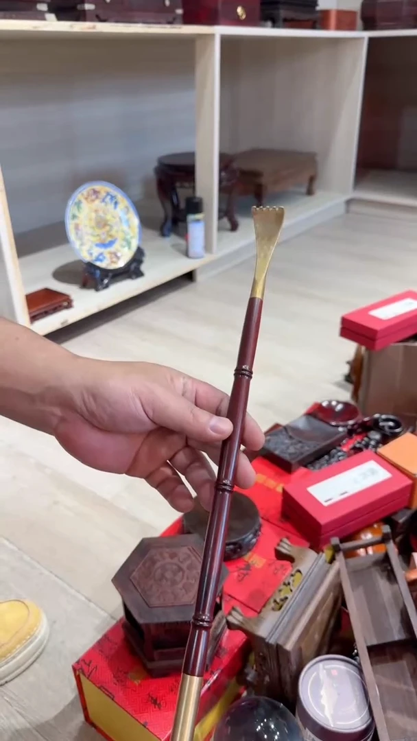 木 光头红木工艺品-铜头痒痒扰