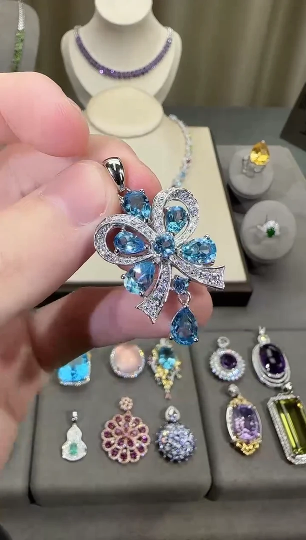 颈饰银S925镶嵌托帕石6*8mm吊坠妖姬蓝流苏设计款