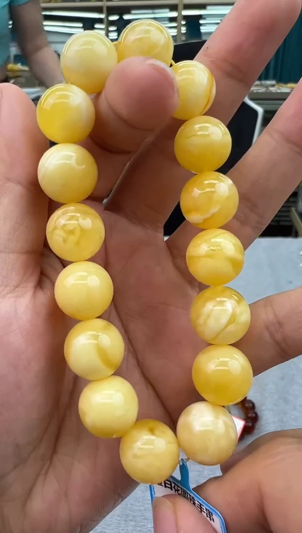 未镶嵌琥珀手链80秒拍号假一罚十