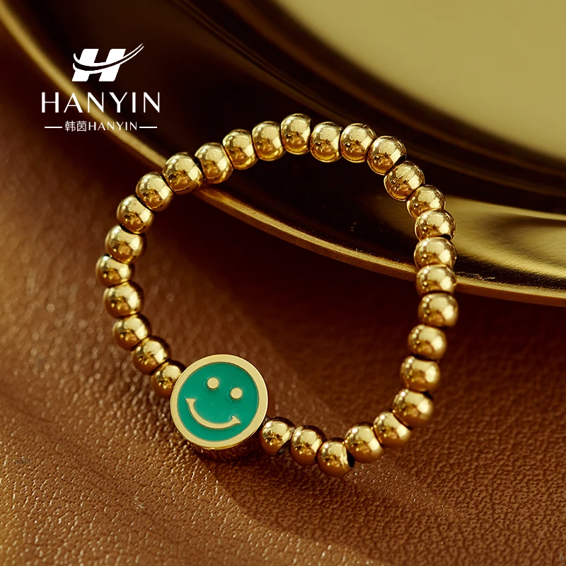 钛钢珐琅戒指 简约时尚串珠弹力绳珠珠笑脸戒指