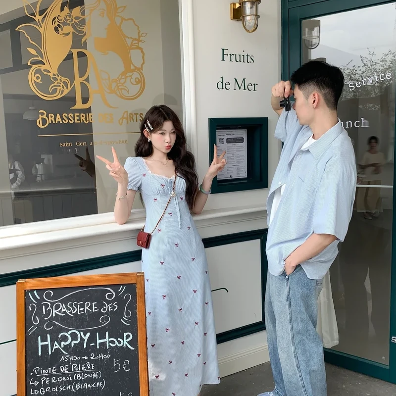 韩系设计感系带连衣裙夏季女气质收腰显瘦气质过膝蕾丝拼接长裙子