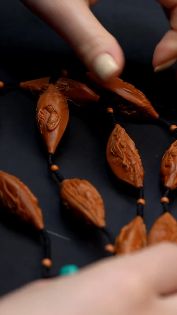 橄榄核手串万佛脖挂