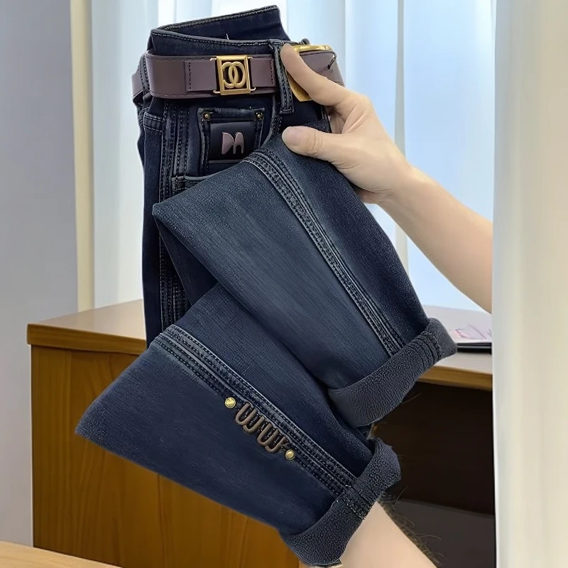 大码女装2025年秋冬季新款牛仔裤子女加绒加厚显瘦哈伦老爹萝卜裤