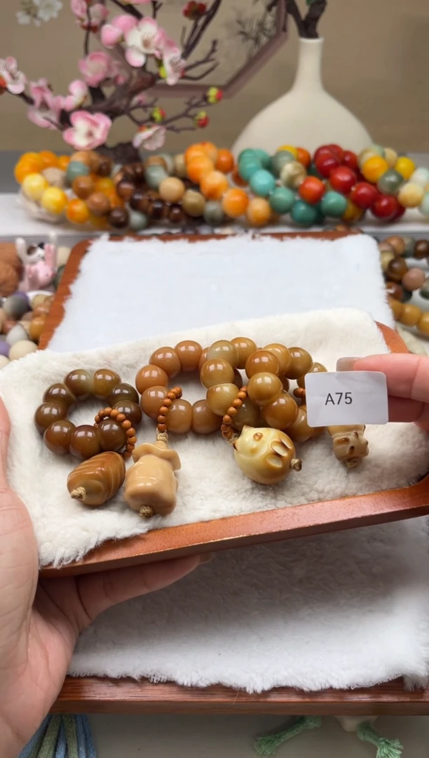 菩提根/象牙果吊坠瑕A75蒜瓣手捻13+mm一串随机