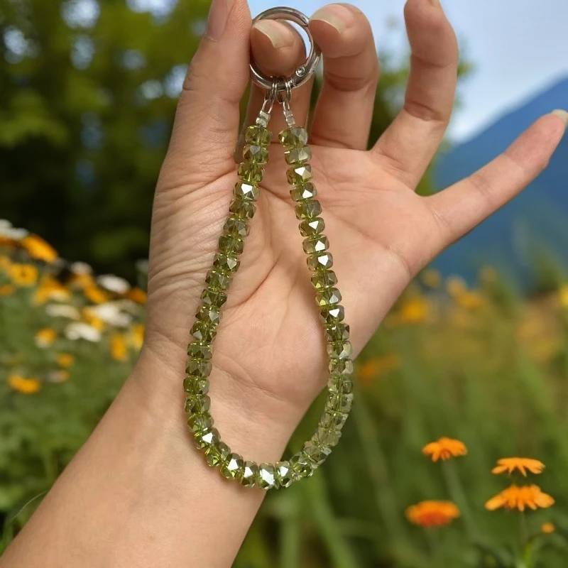 118牛油果绿色的玻璃水晶手机链赠送不锈钢金属360度旋转的垫片