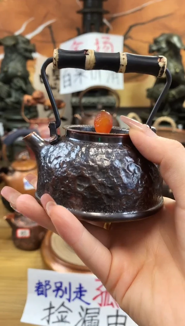 风*线紫竹提梁黑色锤纹壶