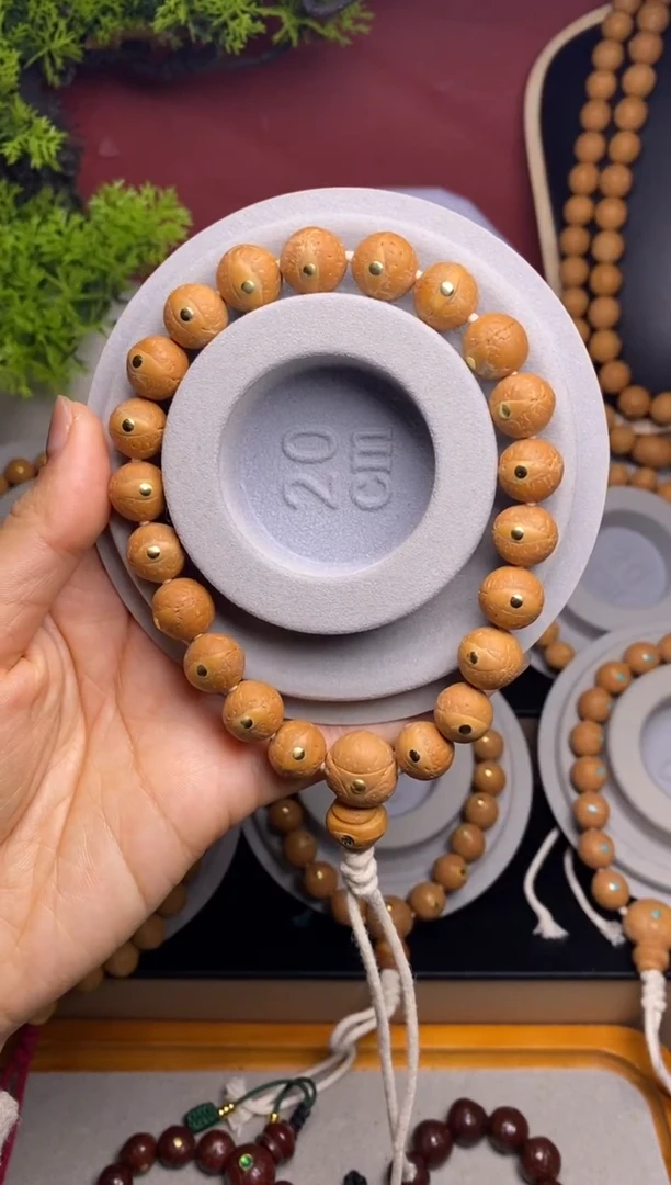 吊坠凤眼菩提12铜钉手串