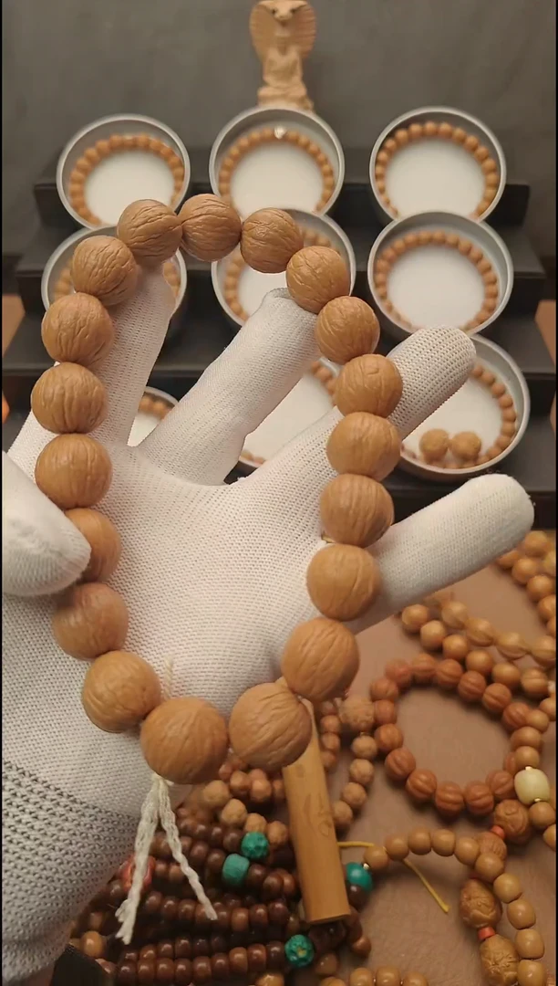 手串猴头核桃凤羽原皮手持已打底