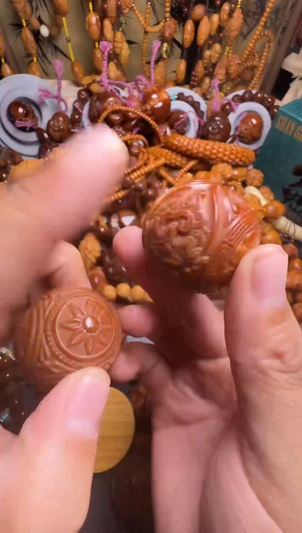 手串橄榄核黄财神一对