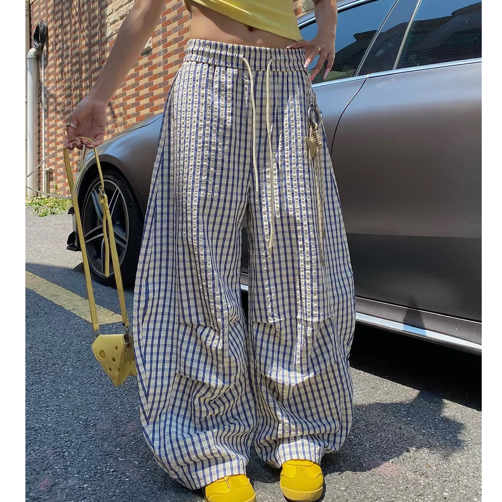 【奥莉】2025春夏：星星挂饰蓝色格纹褶皱抽绳弯刀裤3172
