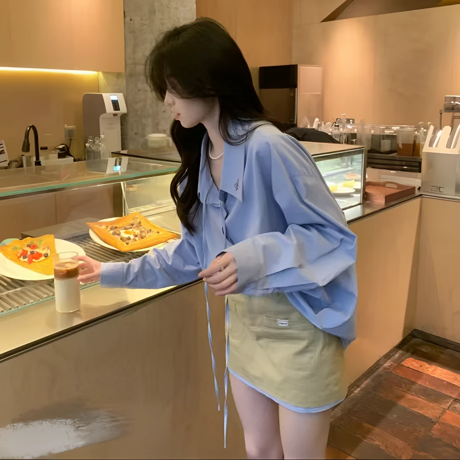 2025春季新款女装设计感飘带蓝色衬衫加显瘦半身裙套装