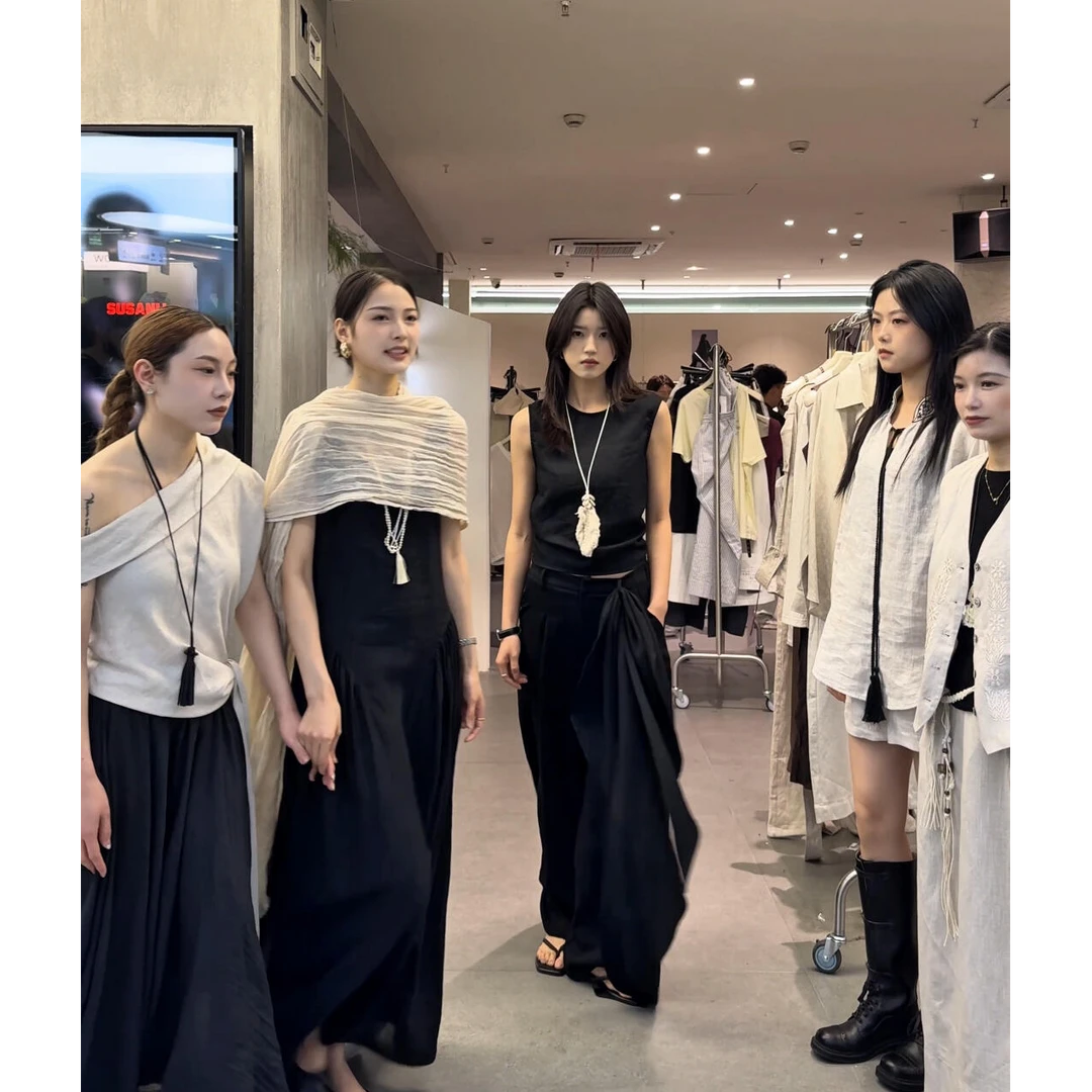 2025夏季新款轻熟风无袖露背设计感背心上衣搭高腰绑带阔腿裤套装