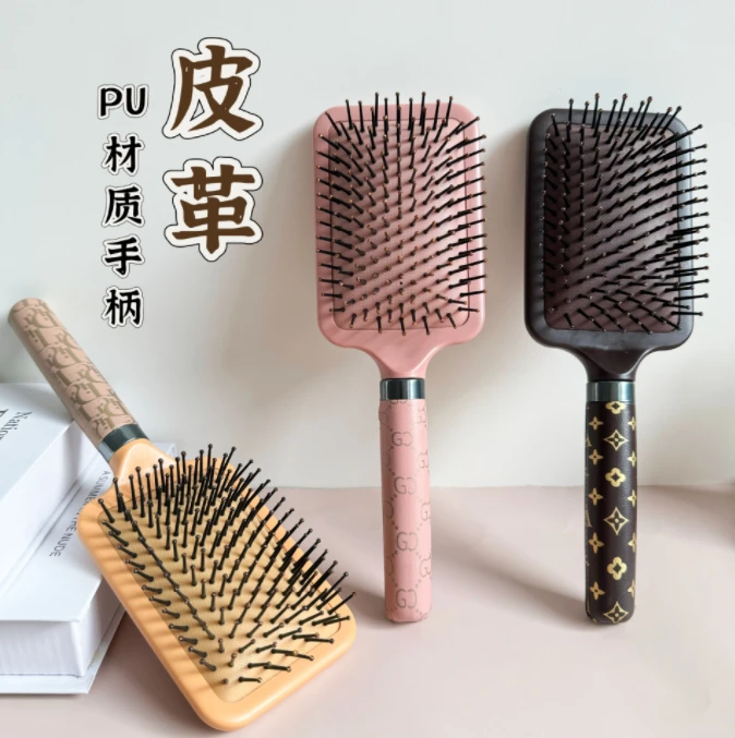 皮革手柄大板气垫梳家用女士蓬松造型顺发气囊梳按摩梳