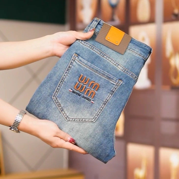 轻奢正品字母印花高端牛仔裤高弹力修身夏季薄款时尚九分裤长裤子