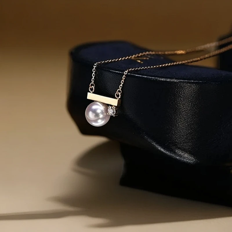 钛钢吊坠 钛钢平衡木女锁骨链法式轻奢设计小众仿珍珠高级设计感