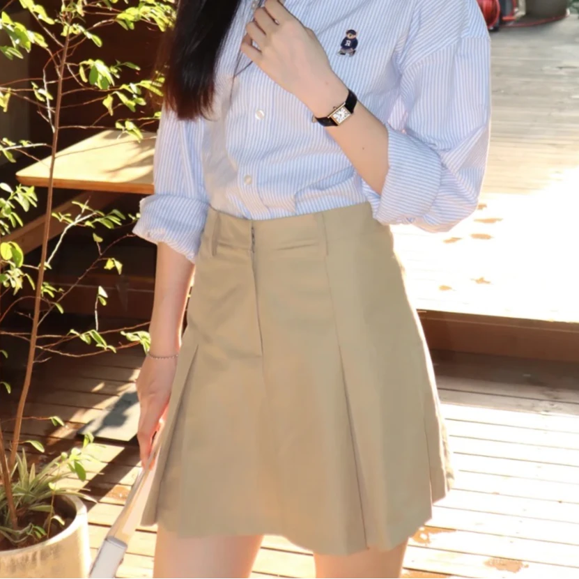 卡其色高腰半身裙女2025夏季新款设计感复古气质a字短裙LQ0069