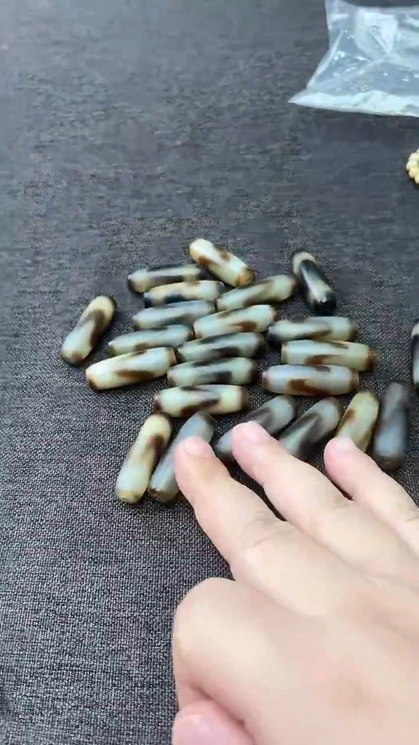 只买单纯的吊坠，没带链子，属的性质。无000002虎牙天珠