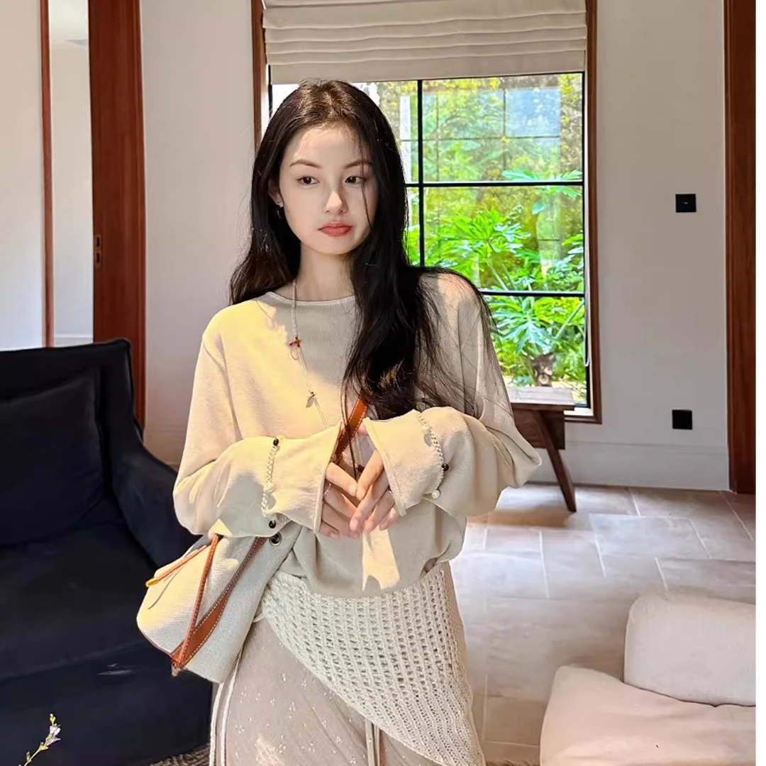 高端货~春秋高级感纯色镂空拼接订珠设计宽松显瘦针织衫女外套