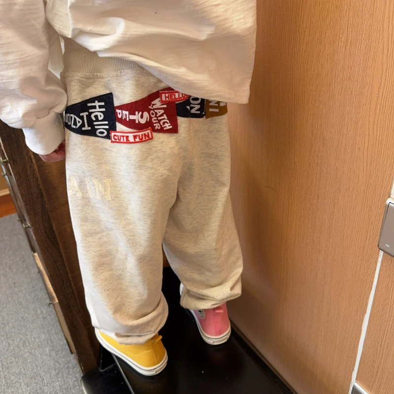 令佳潮牌新款儿童时尚韩版贴布刺绣束脚毛圈卫裤休闲加绒裤3207
