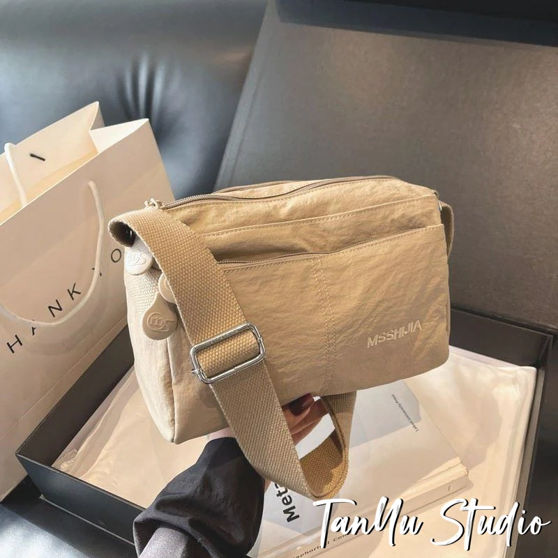 探屿潮牌男女多层时尚休闲百搭单肩包包女小众洋气高级感斜挎包男