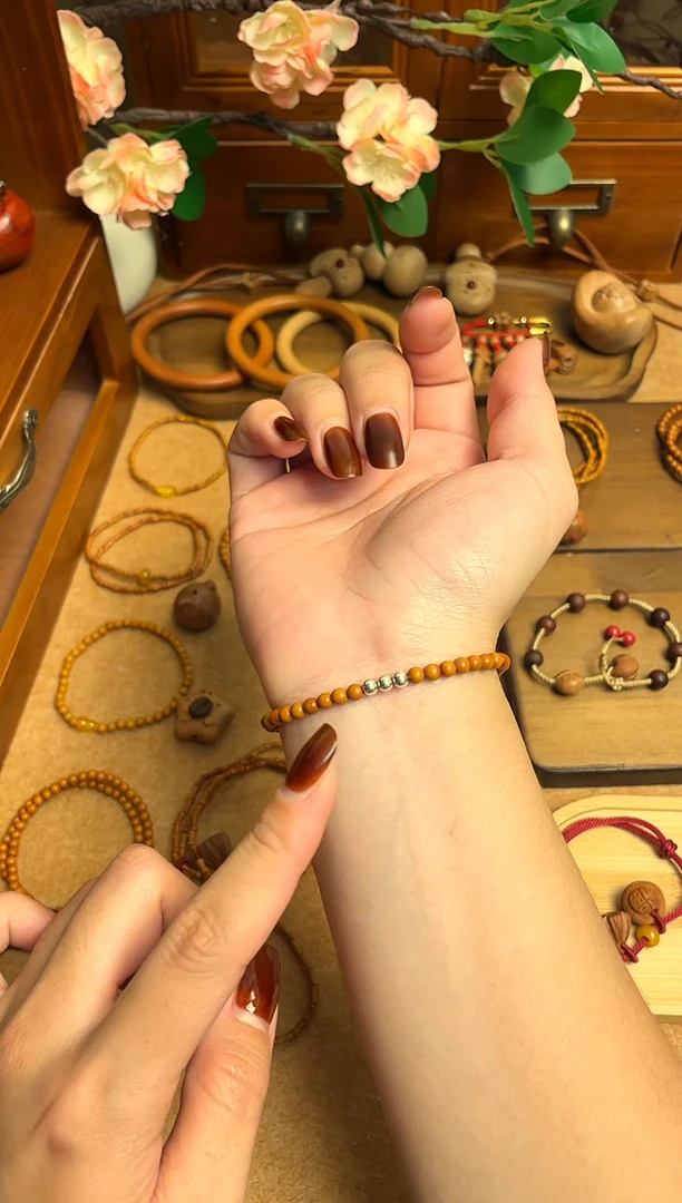 桃核银珠    一物一拍