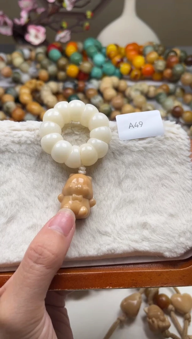 菩提根/象牙果手串瑕A49蒜瓣手捻14+mm一串随机