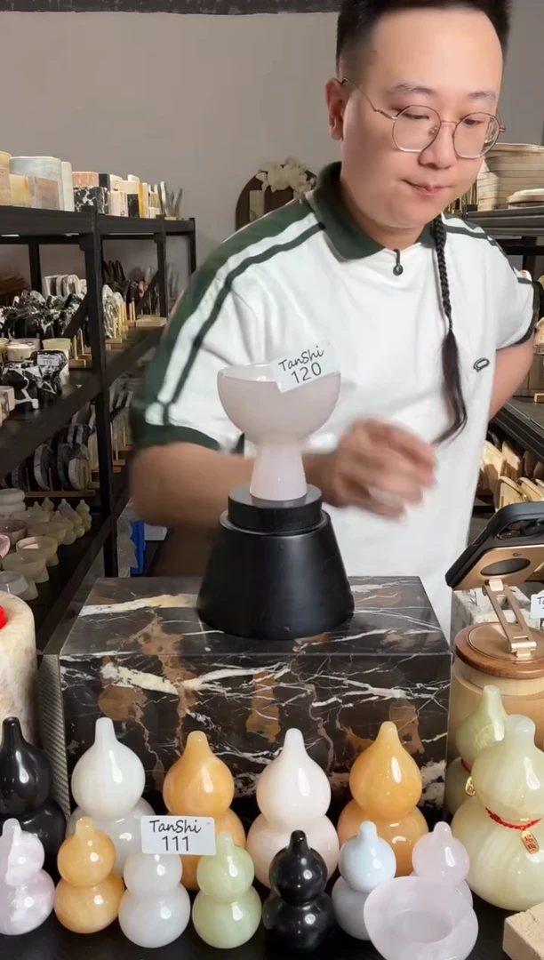 石材120粉玉手捧花
