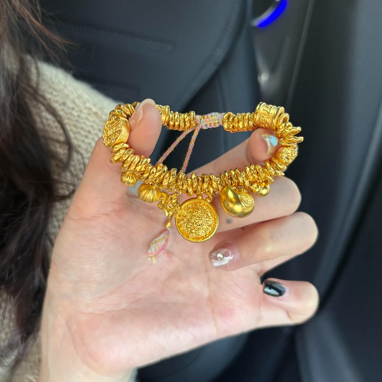 铜合金手链 新款新中式设计星星高级手饰小钱袋盘缠海边度假风款