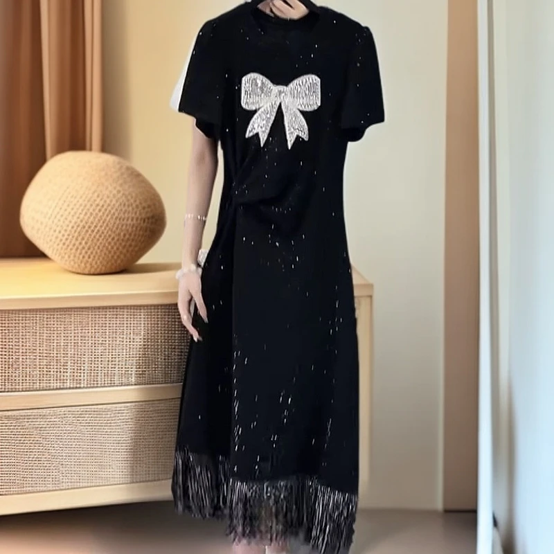 8950时尚潮流带亮片蝴蝶结收腰显瘦流苏下摆夏季新款百搭连衣裙女