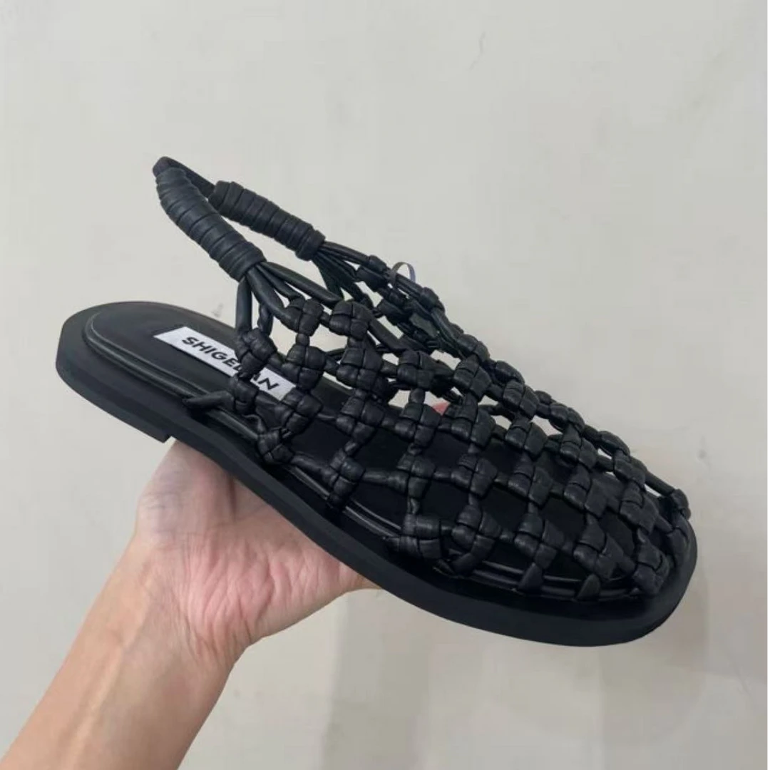 诗歌兰女鞋2025夏季新款真皮时尚编织一脚蹬休闲凉鞋2282-7