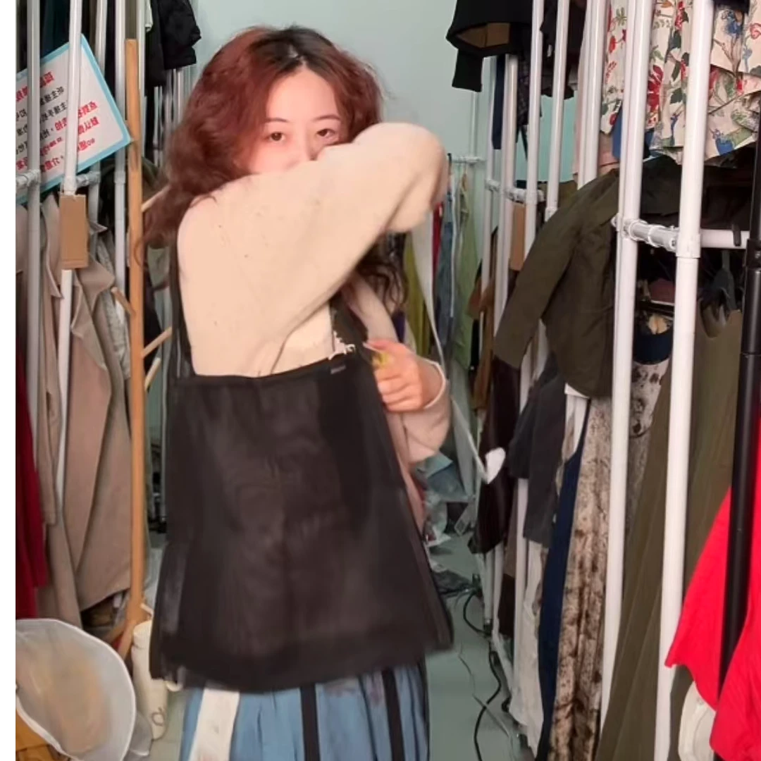 简洁棉织带包边单肩网包