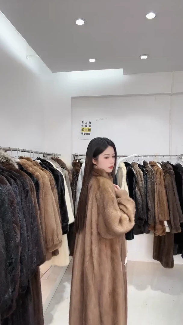 小橙子皮草直博间