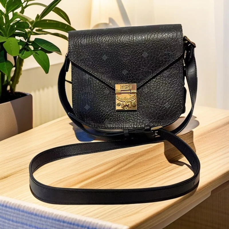 95新 MCM  黑色马鞍斜挎包 1239 9741