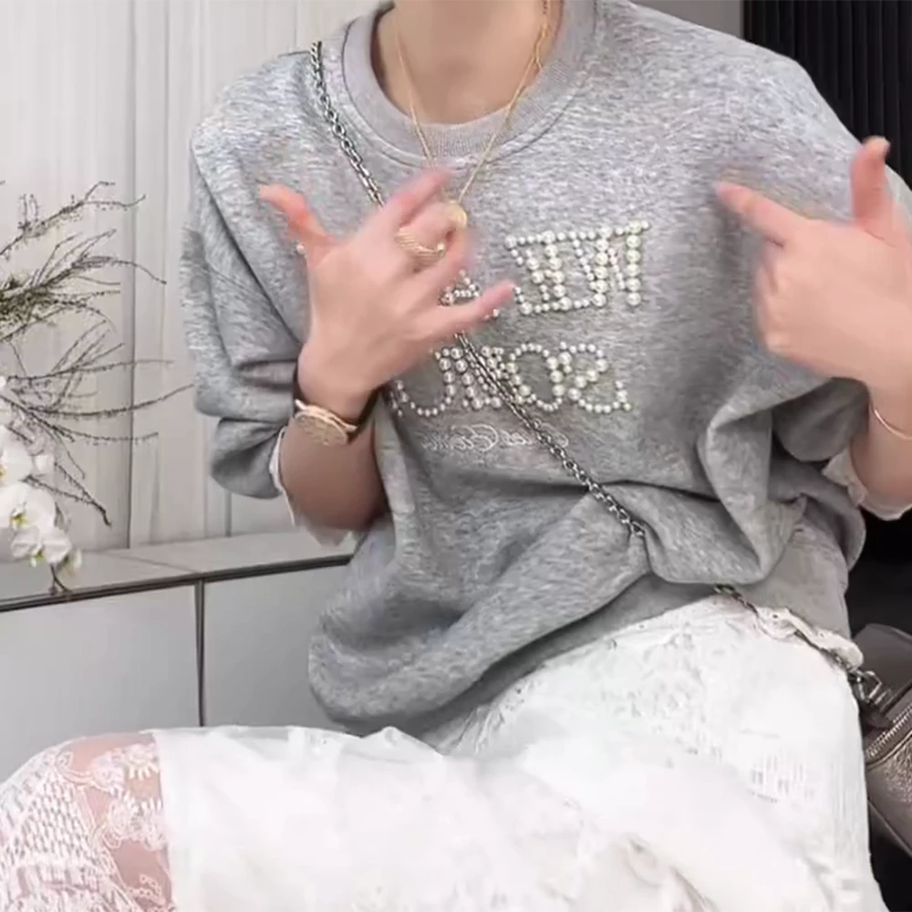 春夏季新款长袖蕾丝边拼接假两件字母珍珠刺绣百搭卫衣上衣女