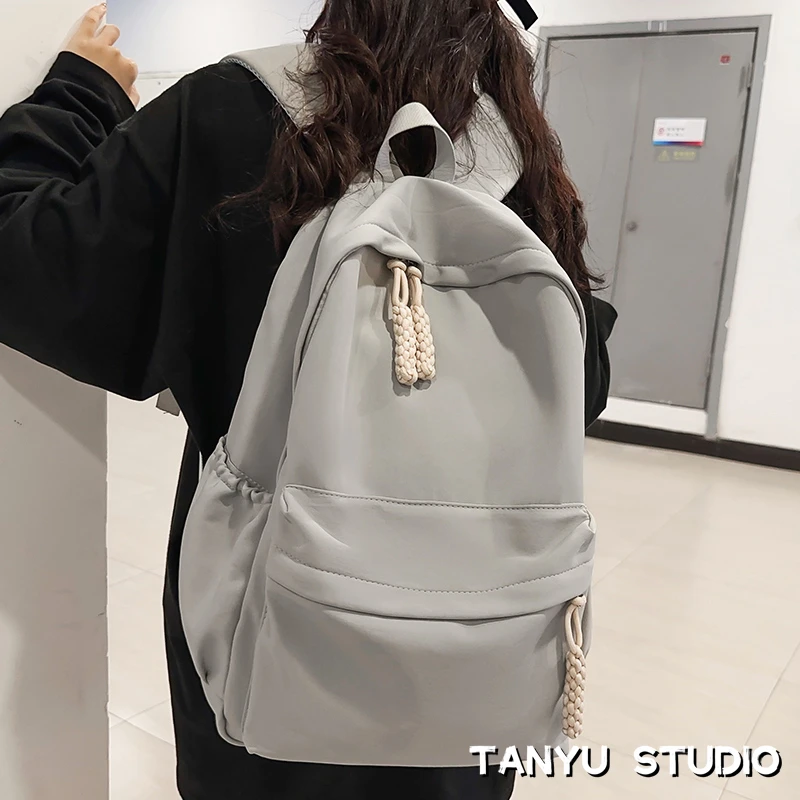 探屿书包女生新款背包大容量初高中生简约设计感小众大学生双肩包