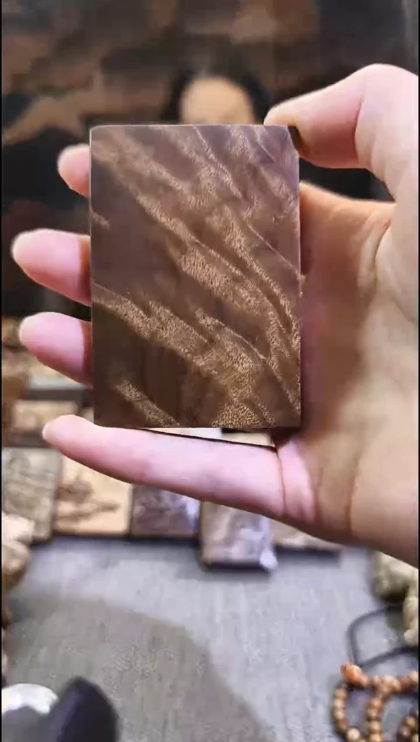 金丝        楠无事牌手把件