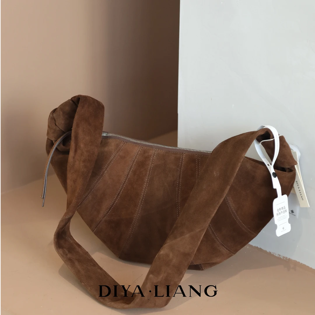 都市简约单根磨砂拼接纯色斜挎包水桶包个性复古女士MC-6271