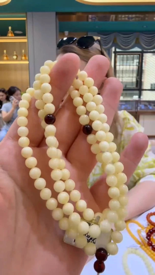 琥珀颈饰未镶嵌假一罚三