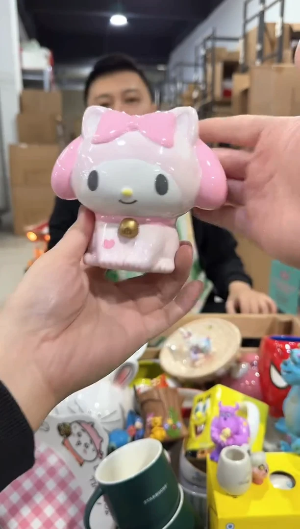 瓷片美乐蒂蹲坐钱罐