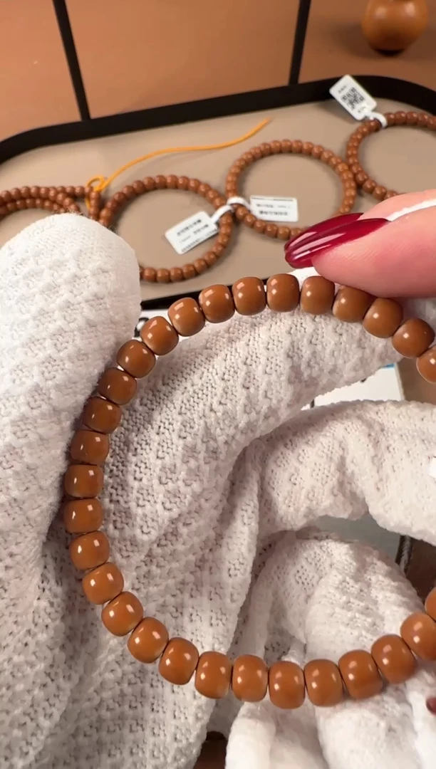 手串橄榄核6.6mm老挝核尖单圈，孔道三花