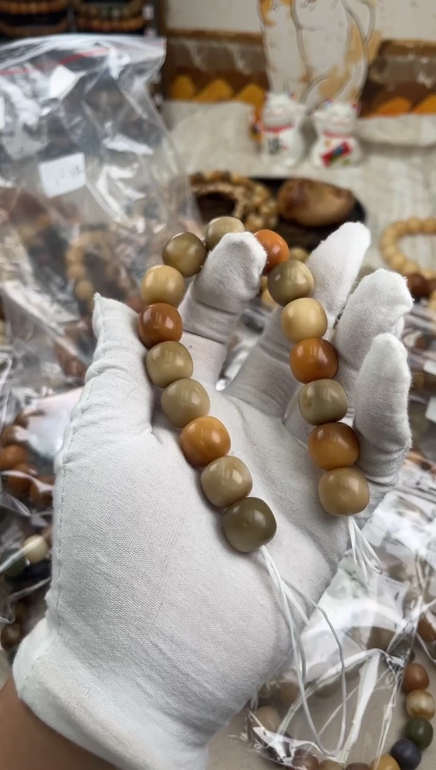 菩提根/象牙果手串是**呐a5卡16 干磨奶咖老料